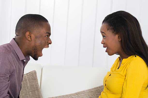 istock Man Screaming At Woman 591402844