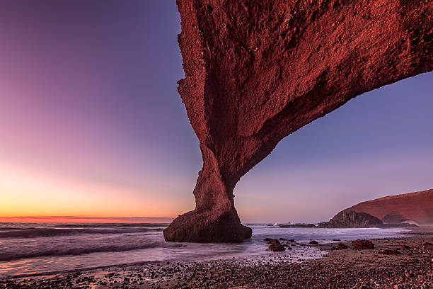 istock Red arches of Legzira beach 591403934