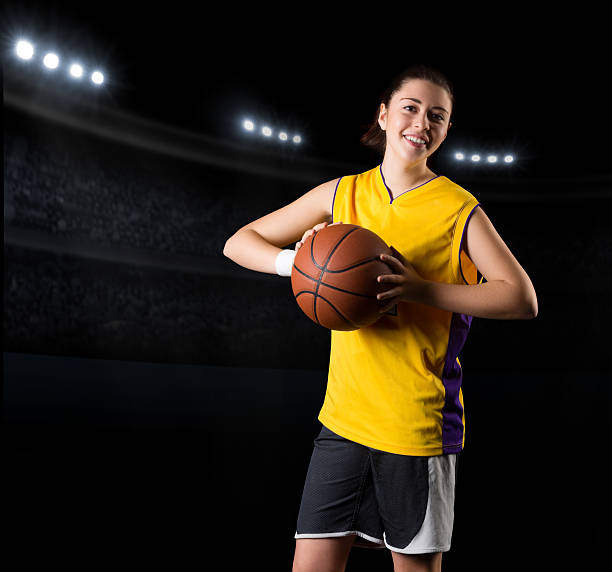 istock Young girl basketball player 591404290