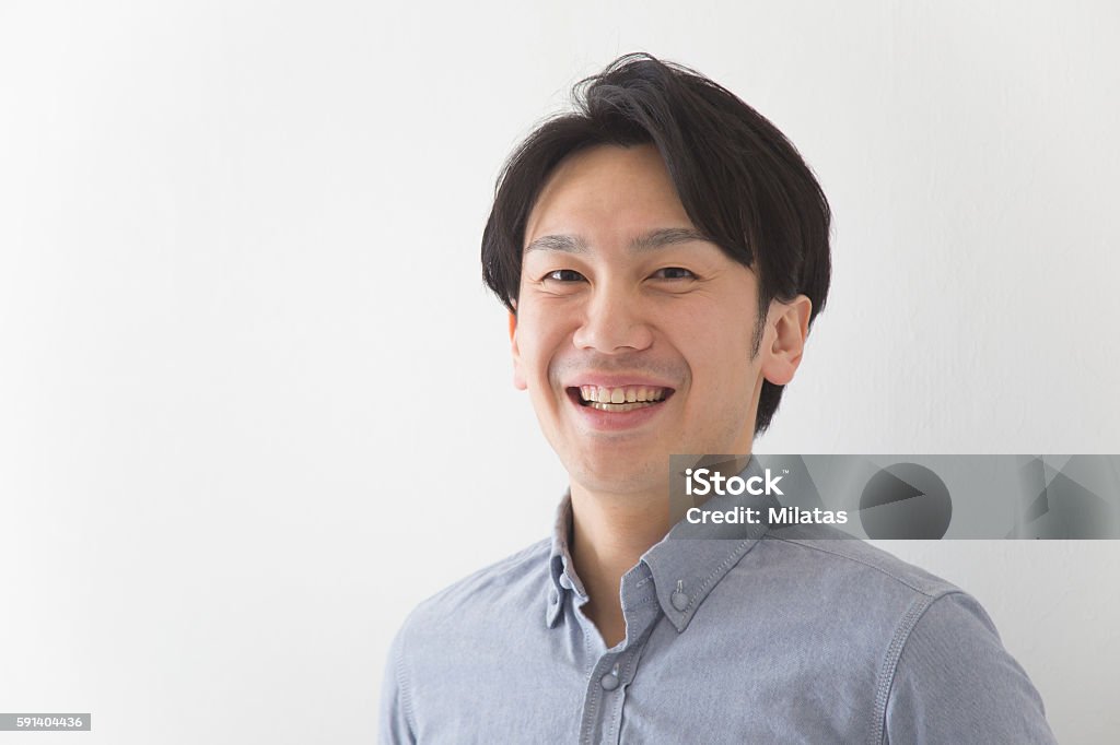 Japanische Mann in die Kamera schauend - Lizenzfrei Männer Stock-Foto