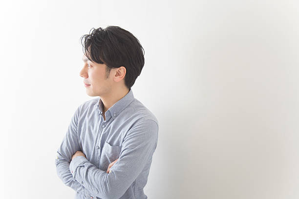istock Japanese man looking away from camera 591404480