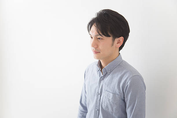 istock Japanese man looking away from camera 591404960