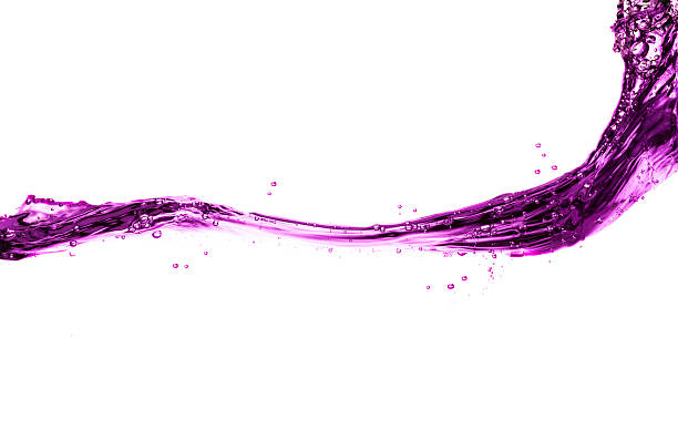 purple water splash on a white background. stock photo
