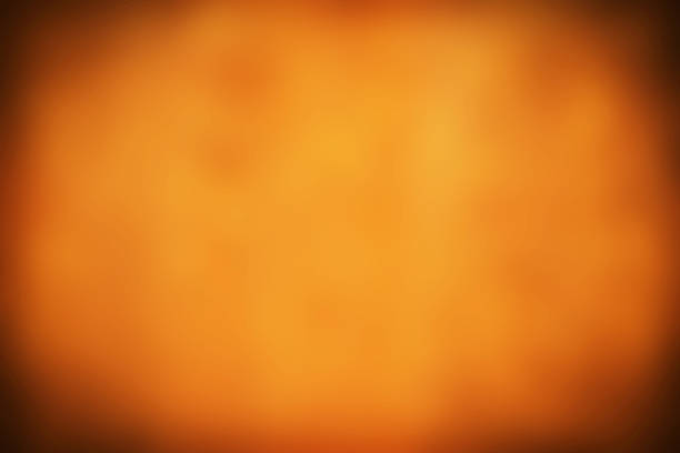 istock Abstract orange blurred Halloween background and thanksgiving 591407290