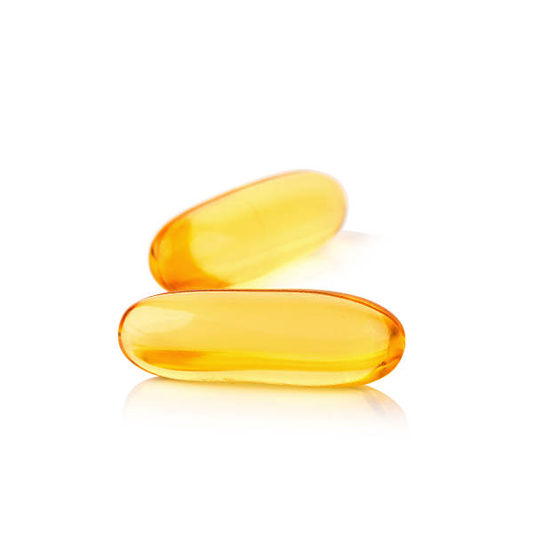 istock Omega 3 capsules from Fish Oil on white background 591408142