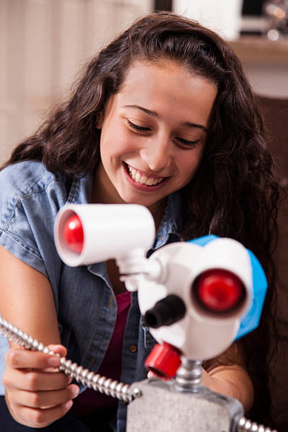 istock Teenage girls studying science, engineering at home. Homework. 591413768
