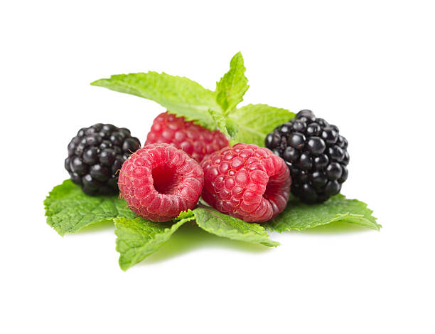 istock Mix of different berries on a white background. Isolated 591414112