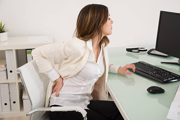 istock Businesswoman Suffering From Backache 591414560