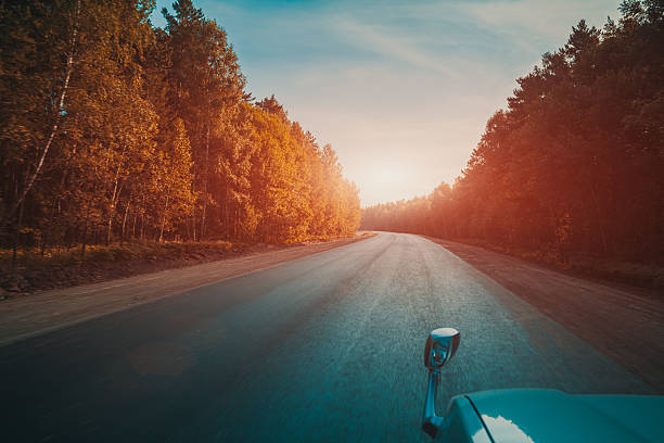 istock Driving in a car, on a road 591415456