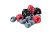 Mix of different berries on a white background