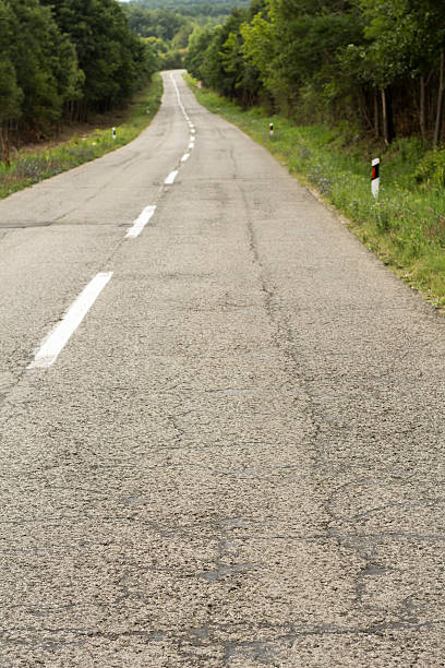 istock Country asphalt road 591416146