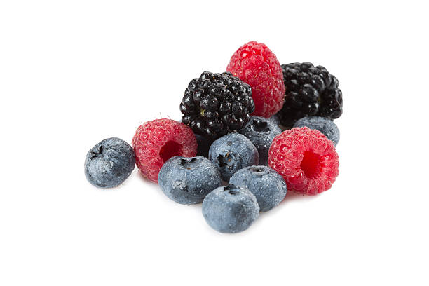 istock Mix of different berries on a white background. Isolated 591416518