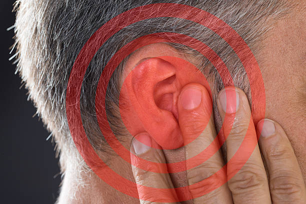 istock Man Covering Ear With Hand 591417168