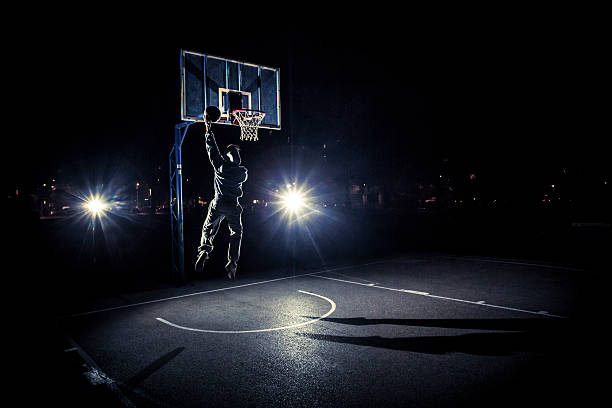 istock Young man playing basketball 591418716