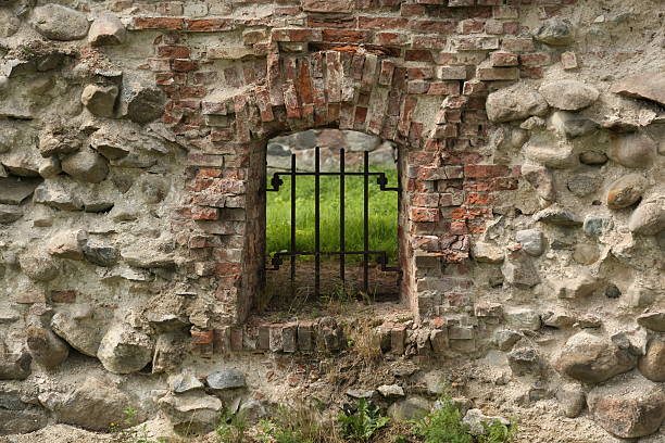 Window in the stone wall of the ancient fort
