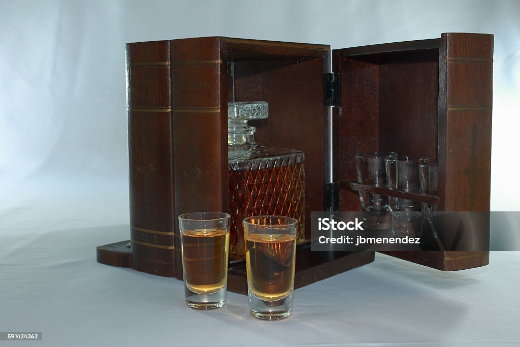 Vintage Mini Bar Vintage wood mini bar with shot glasses Cabinet Stock Photo