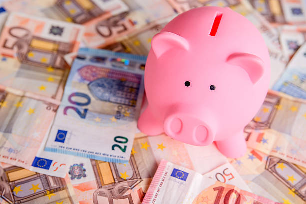 istock piggy bank with Euro notes, finance concept 591425326