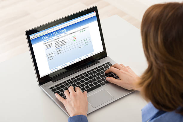 istock Woman Banking Online On Laptop 591427424