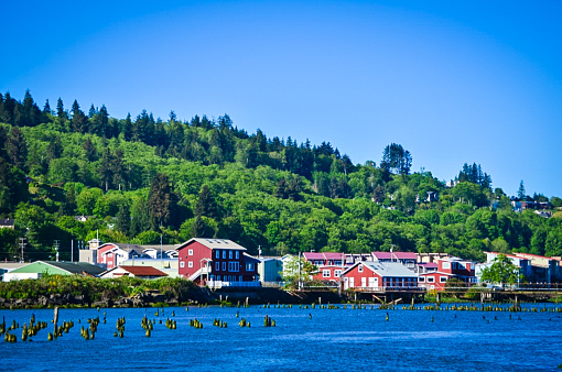 Village of Astoria, OR in spring on the bank of the Columbia river where it meets the Pacific Ocean