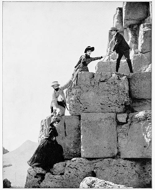istock Climbing the Great Pyramids, Egypt in 1880s 591436934