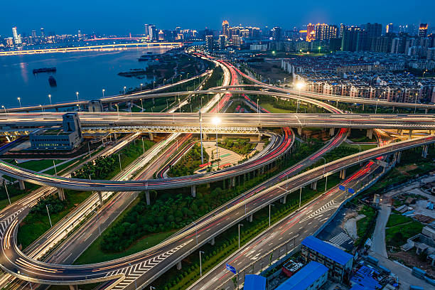 istock City-highway vehicles in the dusk 591437346
