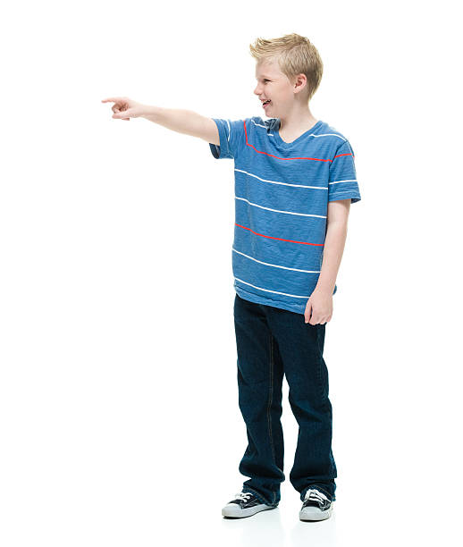 istock Smiling male pointing away 591439452