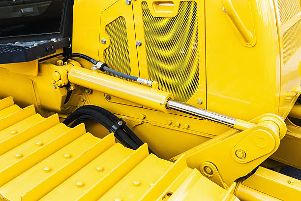 hydraulique tracteur jaune - construction equipment earth mover hydraulic platform cylinder photos et images de collection