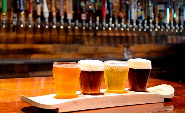 istock Four pints of beer in the pub on the Boards 591782396