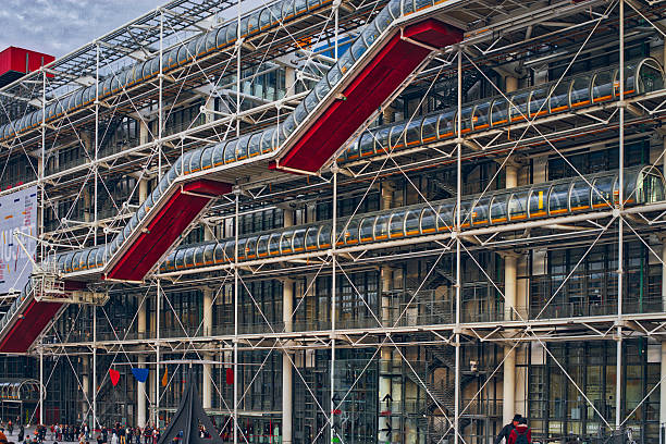 Centre Georges Pompidou was designed in style of high-tech architectur Paris, France - September 17, 2015: Centre Georges Pompidou (1977) was designed in style of high-tech architecture. It houses library, National Art Modern museum and IRCAM. pompidou center stock pictures, royalty-free photos & images