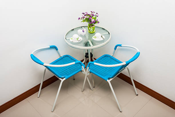 istock Metal Glass Coffee Table Set in Corner 591783026