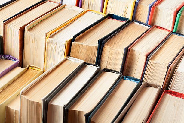 istock Stack of colorful books. Education background. Back to school. Copy 591797756