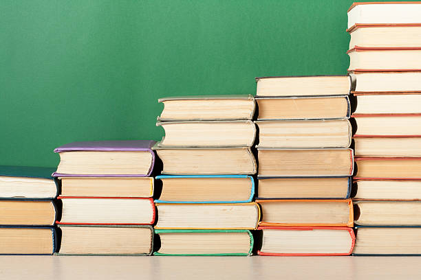 istock Stack of colorful books. Education background. Back to school. Copy 591797994