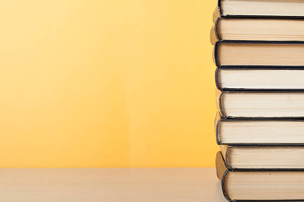 istock Stack of colorful books. Education background. Back to school. Copy 591798428