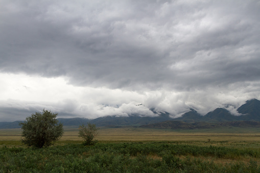 low storm clouds in the mountains of Kazakhstan