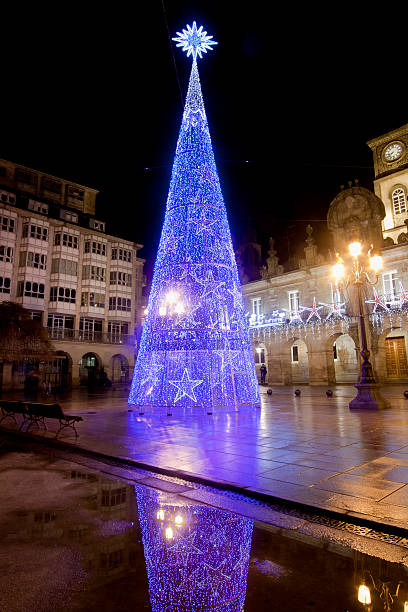 istock Modern lighting Christmas tree, townsquare, Lugo townhall. 591811988