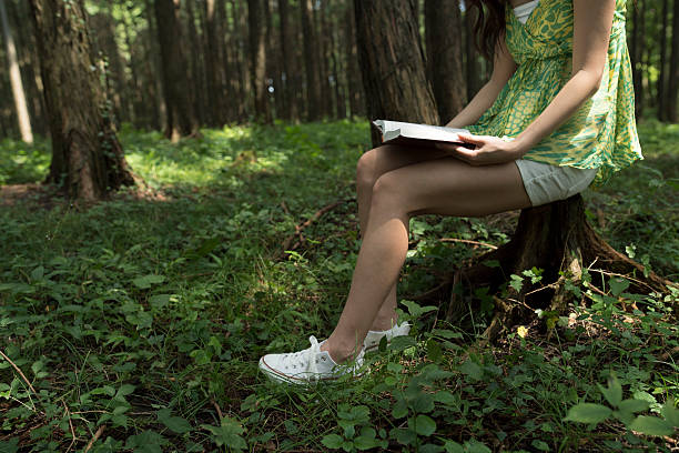 istock Girls enjoy a time of quiet reading. 591812606