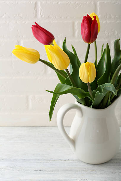 istock Beautiful tulips in vase 591813204