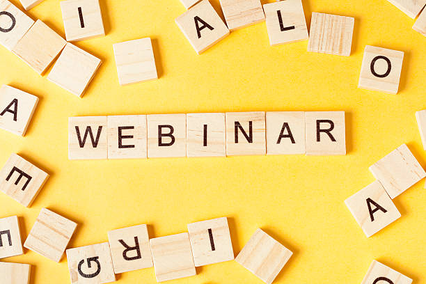 istock Webinar word written on wood block. Wooden ABC 591813420