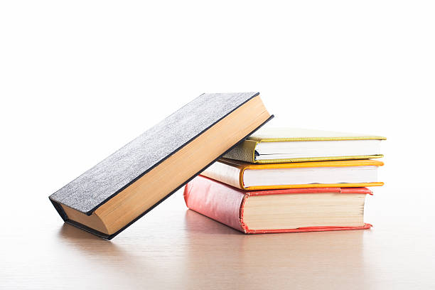 istock Stack of books on white background. Education concept. Back to 591814656