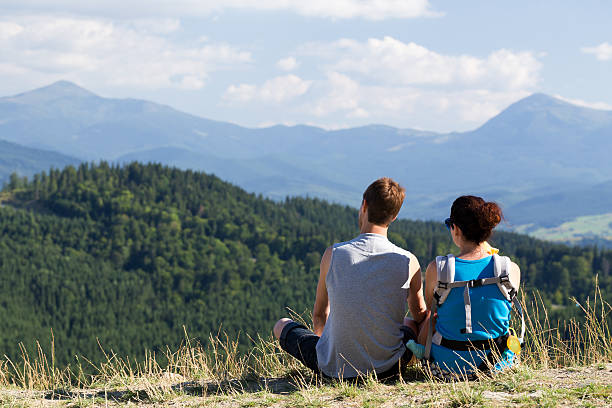 istock Young tourists in the mountains. 591816500
