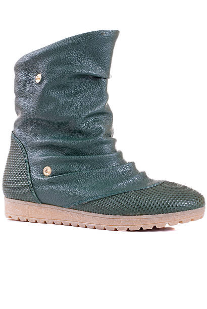 istock green female boots isolated 591816842