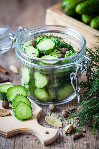 istock Cucumbers ready for pickling. Homemade canning. 591819504