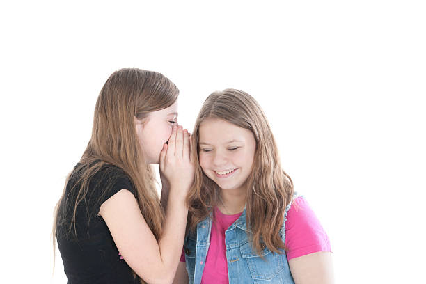 istock two smiling young beautiful girls 591821864