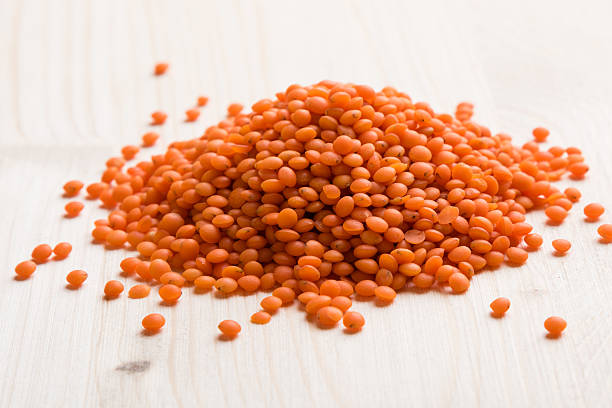 red lentils on table stock photo