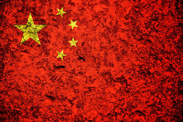 istock Chinese flag on stone background 591828114