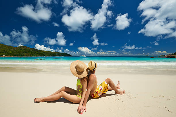 istock Couple on a beach at Seychelles 591829572