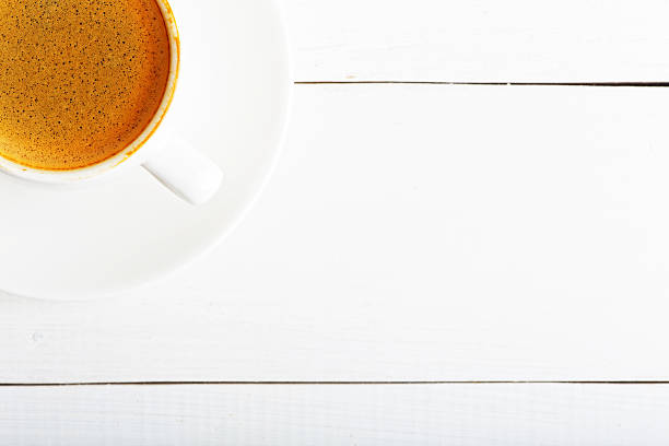 istock White background with cup of espresso 591829722