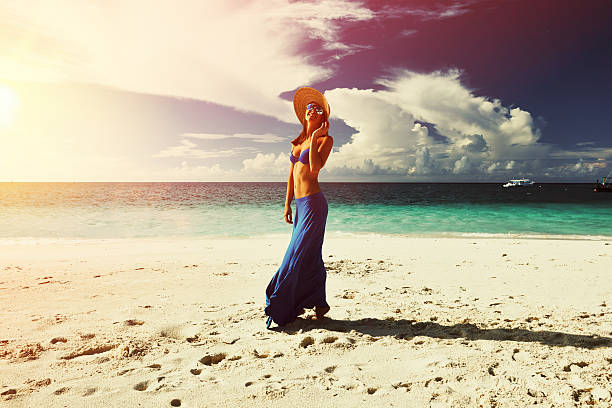 istock Woman at beach 591830322