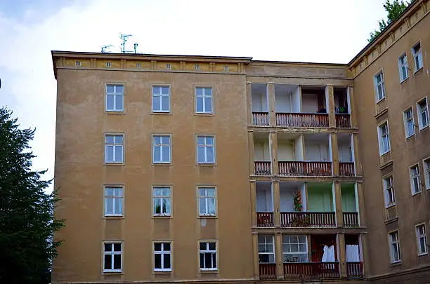 Photo of facade of building with windows of socilalism times in berlin