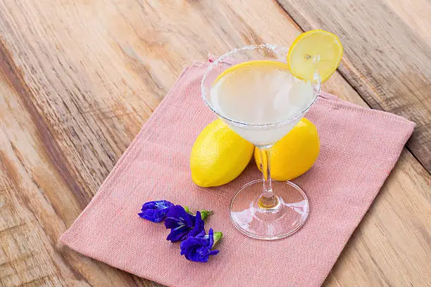 cocktail with a slice of lemon.